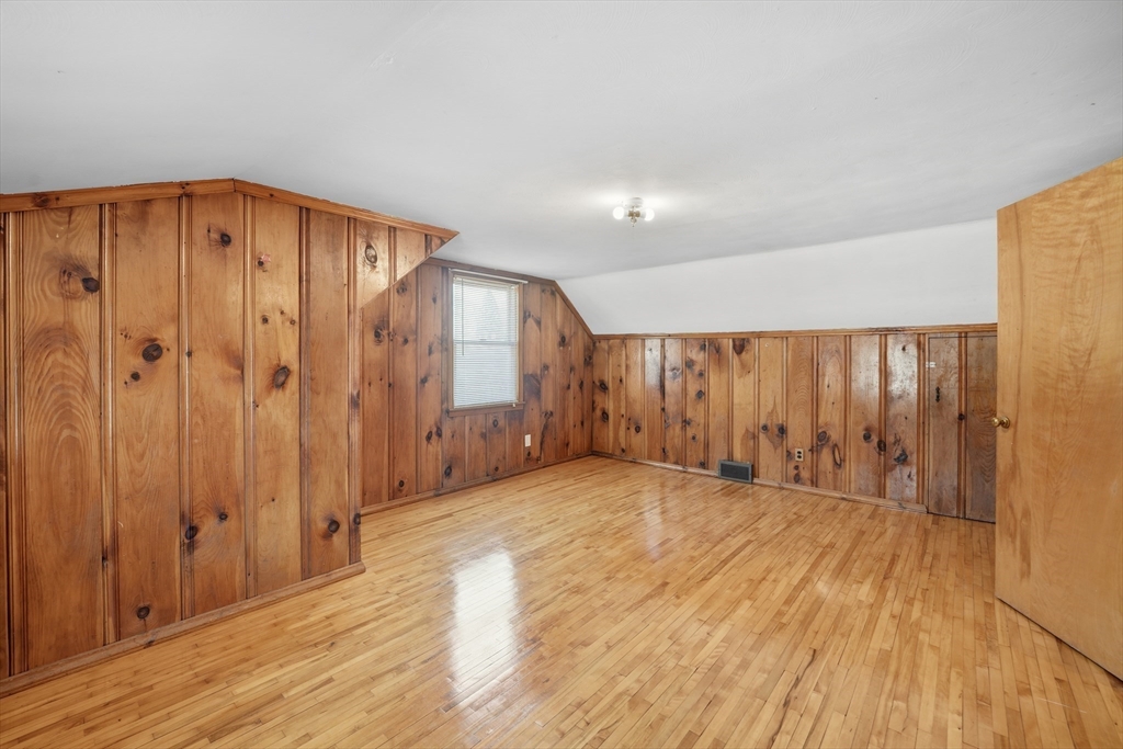 80 Jean Drive Springfield, MA 01104 - Photo 25 of 42 a view of an empty room with wooden floor