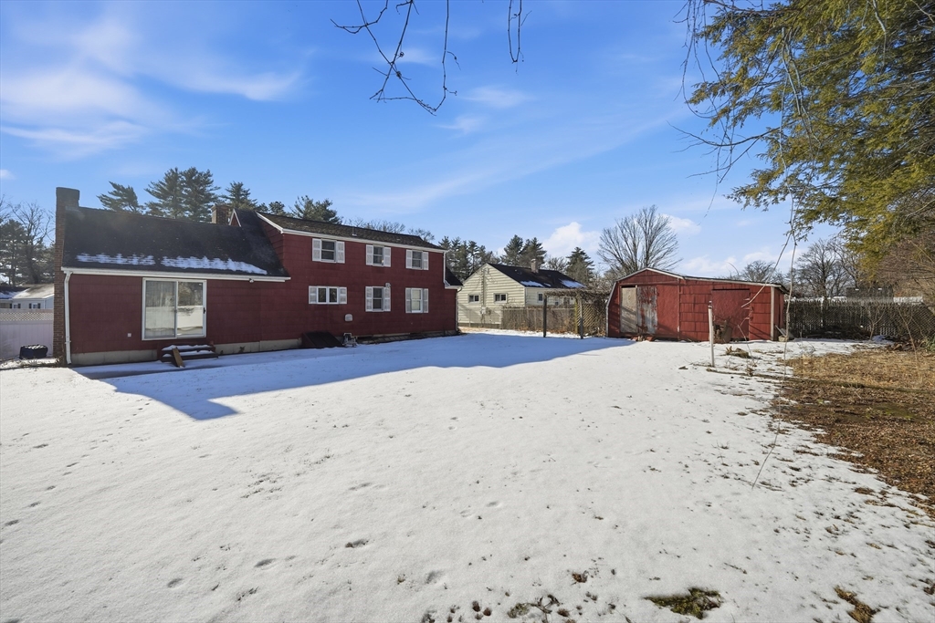 80 Jean Drive Springfield, MA 01104 - Photo 35 of 42 a view of a house with a snow in the yard