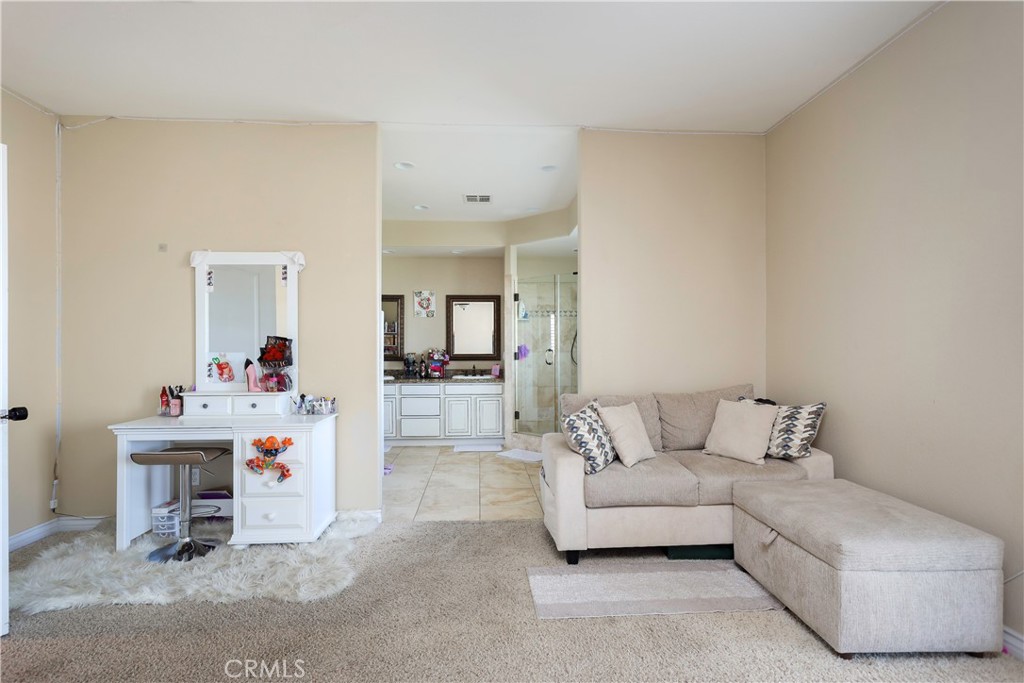 42561 25th Street West Lancaster, CA 93536 - Photo 17 of 41 a living room with furniture and a mirror