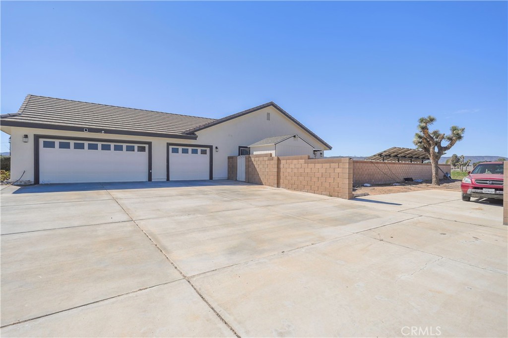 42561 25th Street West Lancaster, CA 93536 - Photo 38 of 41 a house view with a outdoor space