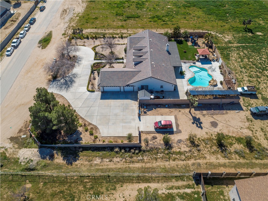 42561 25th Street West Lancaster, CA 93536 - Photo 41 of 41 an aerial view of a house with a lake view
