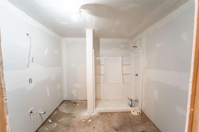 a view of a pathway with a backyard