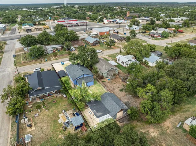 an aerial view of residential building with parking space