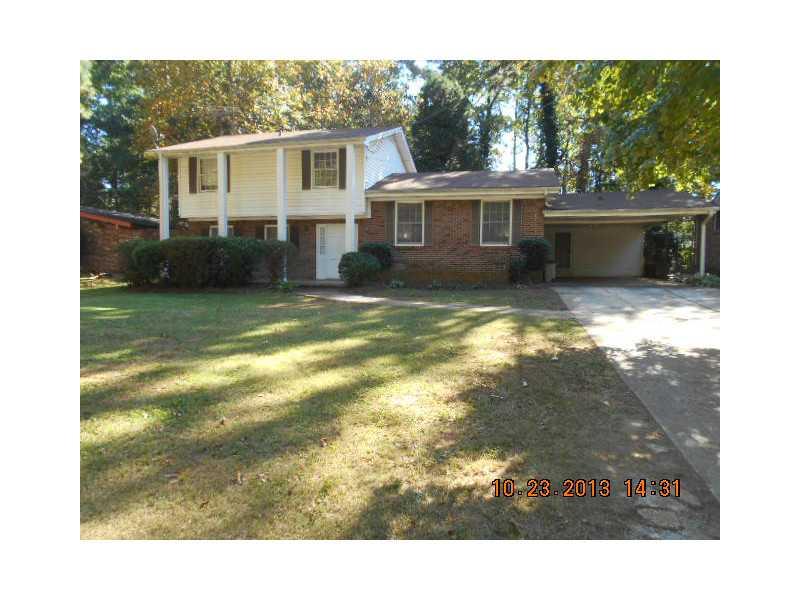 4105 Tiffany Drive Decatur, GA 30035 - Photo 1 of 1 a view of a yard in front of a house with a large tree