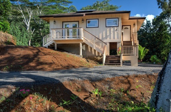4386 Upa Road, Unit 2 Koloa, HI 96756 - Photo 1 of 25 a front view of a house with a yard