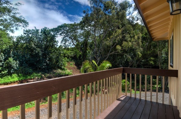 4386 Upa Road, Unit 2 Koloa, HI 96756 - Photo 11 of 25 a balcony with wooden floor and fence