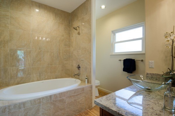 4386 Upa Road, Unit 2 Koloa, HI 96756 - Photo 12 of 25 a bathroom with a tub sink and mirror