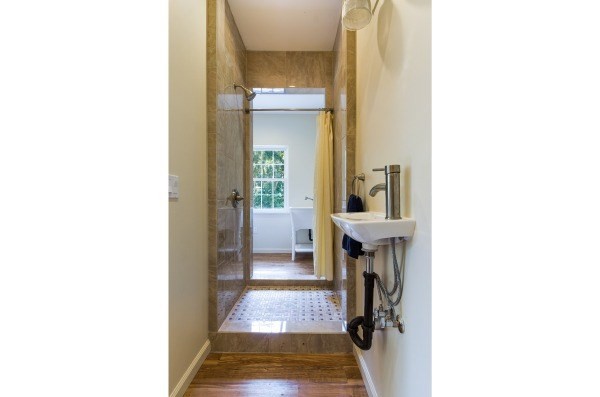 4386 Upa Road, Unit 2 Koloa, HI 96756 - Photo 15 of 25 a bathroom with a sink and a mirror