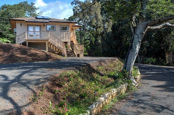 4386 Upa Road, Unit 2 Koloa, HI 96756 - Photo 19 of 25 a view of a yard in front of a house with large tree
