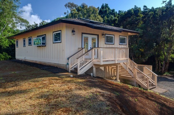 4386 Upa Road, Unit 2 Koloa, HI 96756 - Photo 20 of 25 a front view of a house with a yard