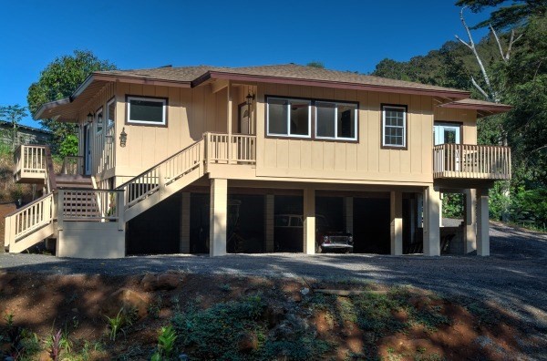 4386 Upa Road, Unit 2 Koloa, HI 96756 - Photo 2 of 25 a front view of a house with a yard