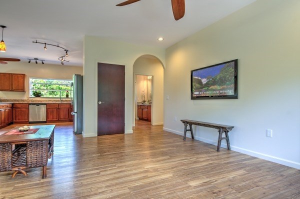 4386 Upa Road, Unit 2 Koloa, HI 96756 - Photo 5 of 25 a view of a living room a dining room wooden floor and a window