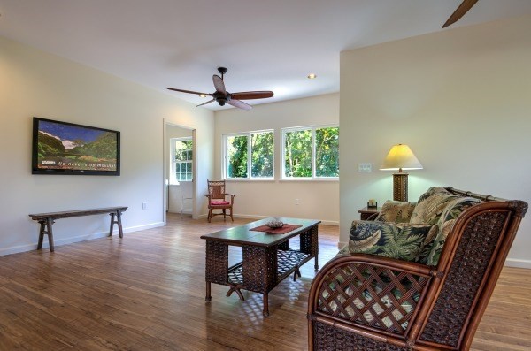 4386 Upa Road, Unit 2 Koloa, HI 96756 - Photo 7 of 25 a living room with furniture and a window