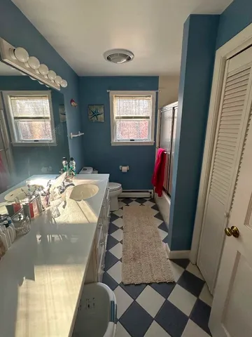 a living room with a couch and a flat screen tv