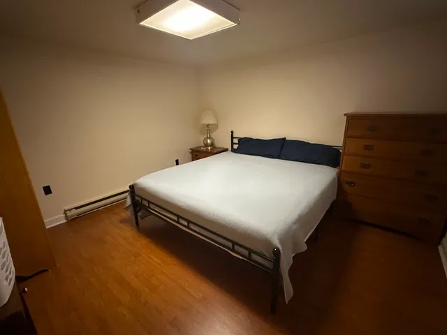 a kitchen with stainless steel appliances a stove a sink and a refrigerator