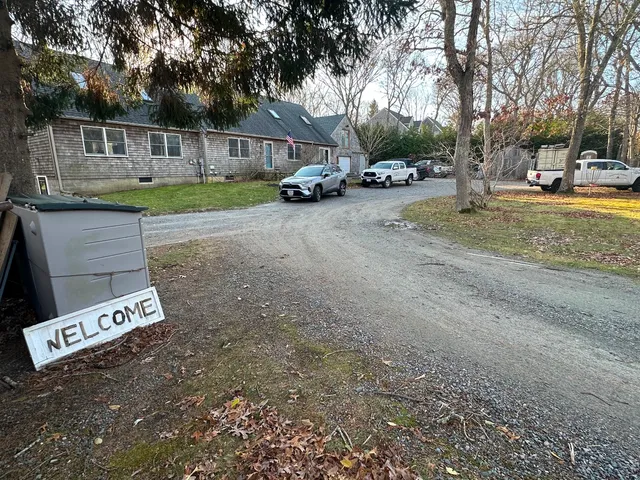 a view of a park with swings and slides