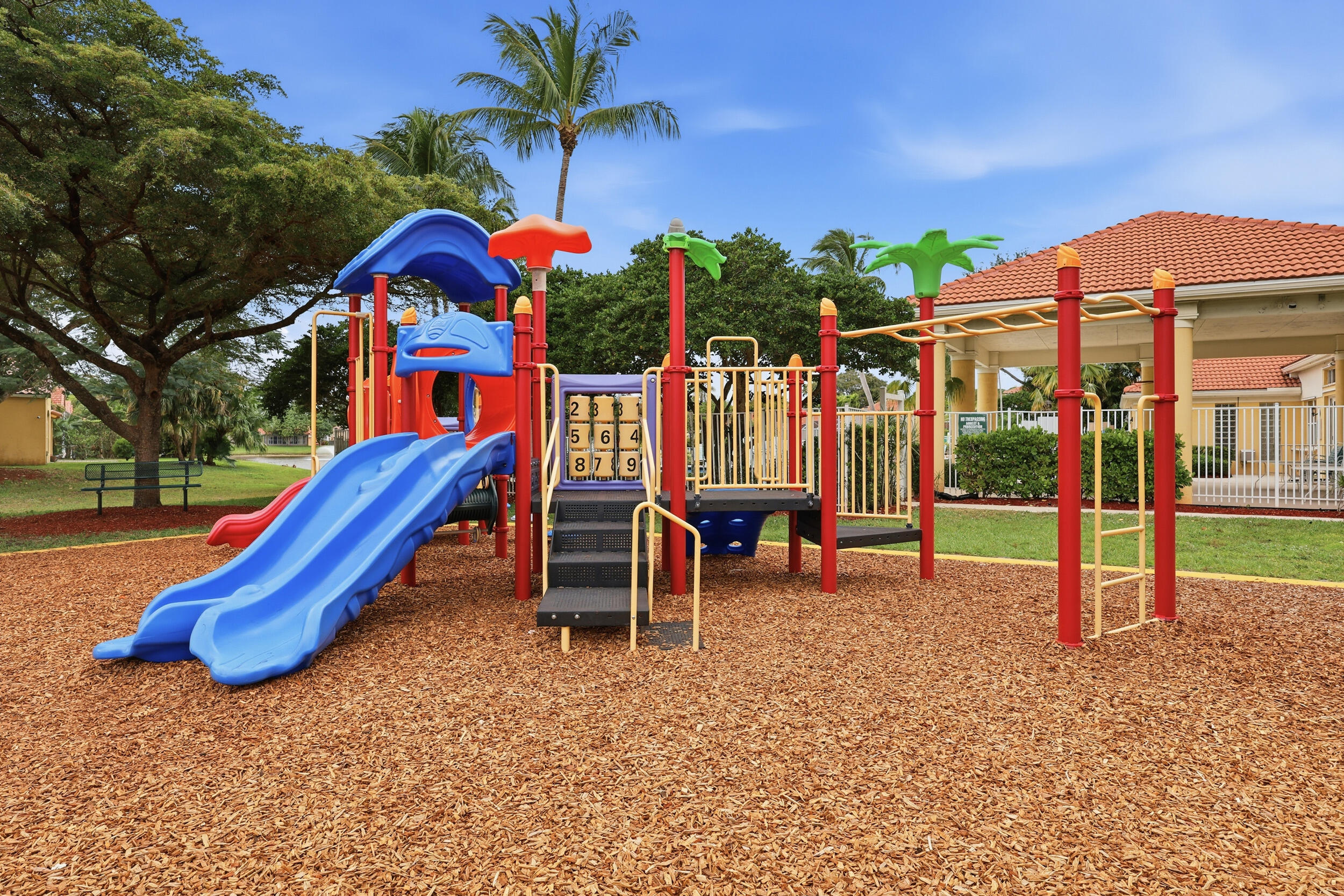 2013 Bonisle Circle Riviera Beach, FL 33418 - Photo 20 of 22 a view of a park with slide