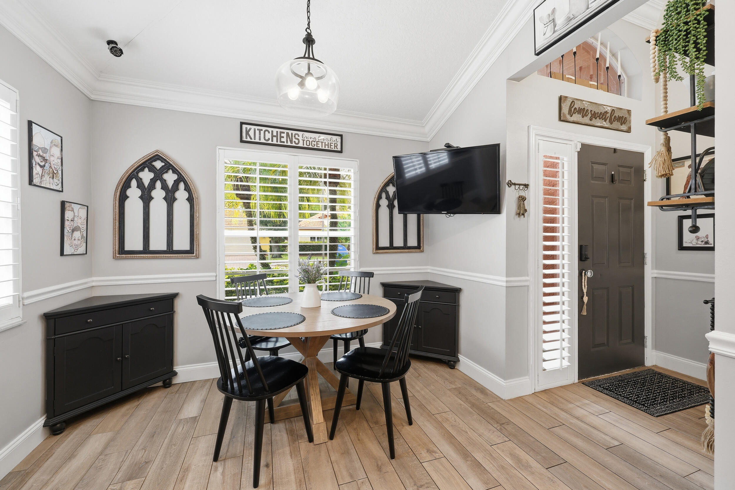 2013 Bonisle Circle Riviera Beach, FL 33418 - Photo 2 of 22 a view of a dining room with furniture window and wooden floor