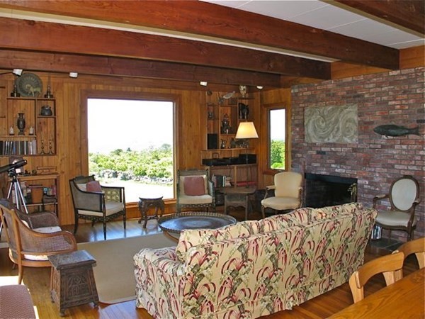 19 Lake Road Chilmark, MA 02535 - Photo 11 of 32 a living room with furniture and a fireplace