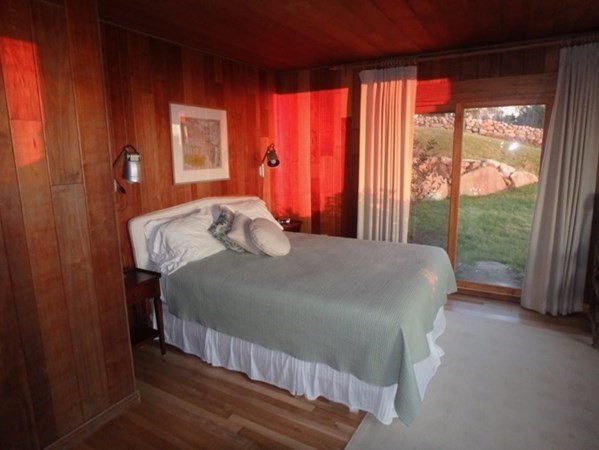 19 Lake Road Chilmark, MA 02535 - Photo 14 of 32 a bedroom with a bed and window