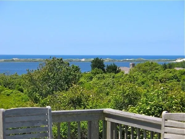 a balcony with an outdoor space