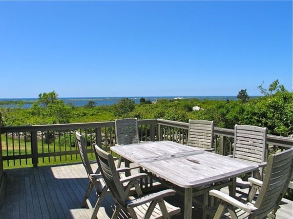 19 Lake Road Chilmark, MA 02535 - Photo 22 of 32 a view of a patio with wooden floor and city view