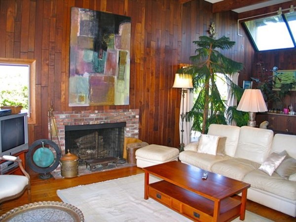 19 Lake Road Chilmark, MA 02535 - Photo 6 of 32 a living room with furniture and a fireplace
