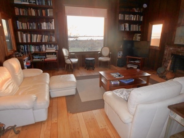 19 Lake Road Chilmark, MA 02535 - Photo 7 of 32 a living room with furniture and a flat screen tv