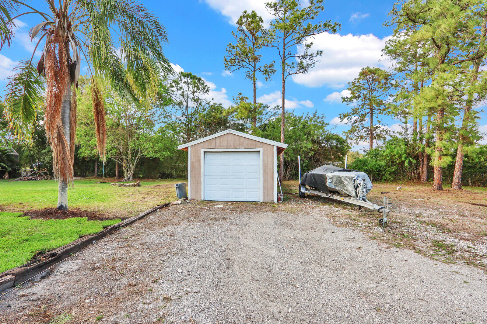 18019 43rd Road North Loxahatchee, FL 33470 - Photo 25 of 35 Storage garage