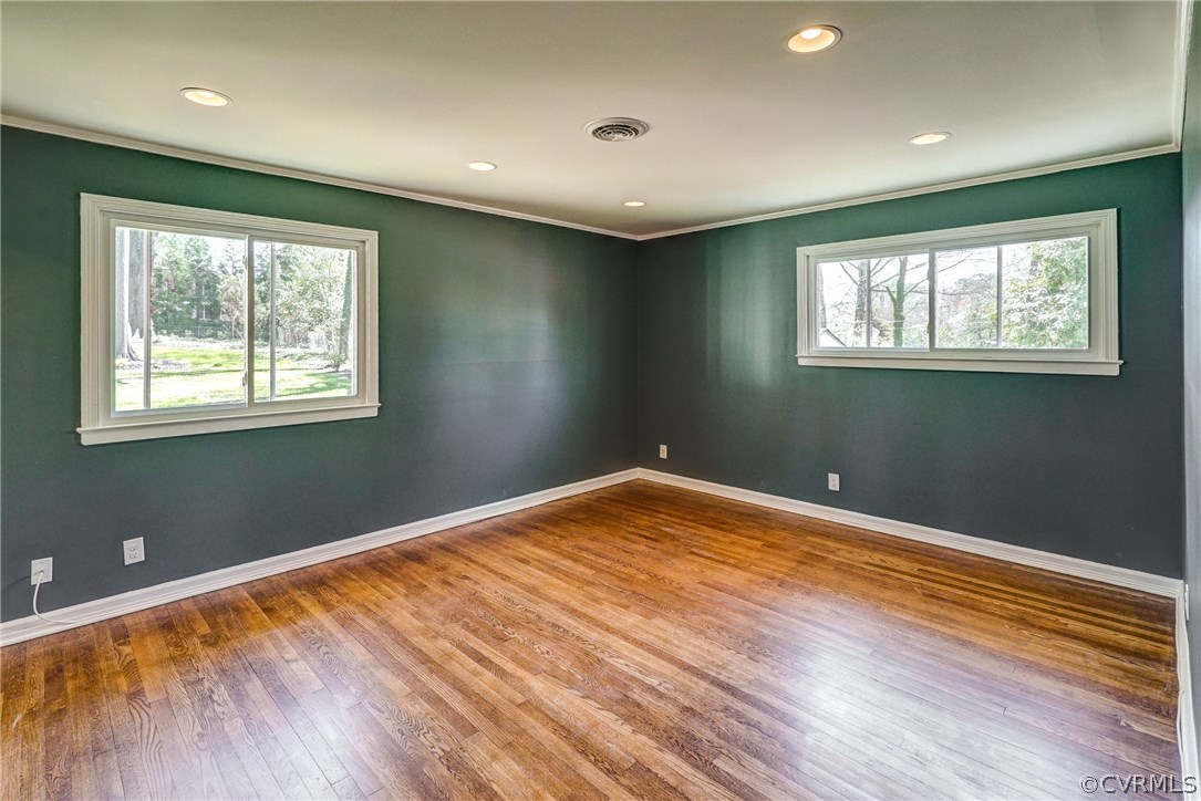 109 North Ridge Road Henrico, VA 23229 - Photo 23 of 41 a view of an empty room with wooden floor and a window