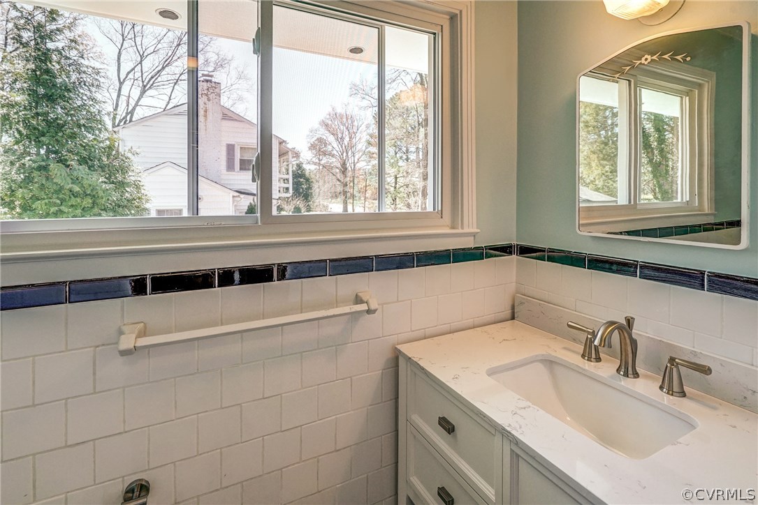 109 North Ridge Road Henrico, VA 23229 - Photo 33 of 41 a bathroom with a sink and a window