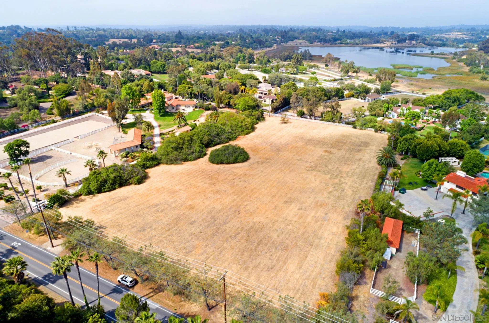 7 St Rancho Santa Fe Ca, Unit 1 Rancho Santa Fe, CA 92067 - Photo 2 of 8 an aerial view of residential houses with outdoor space