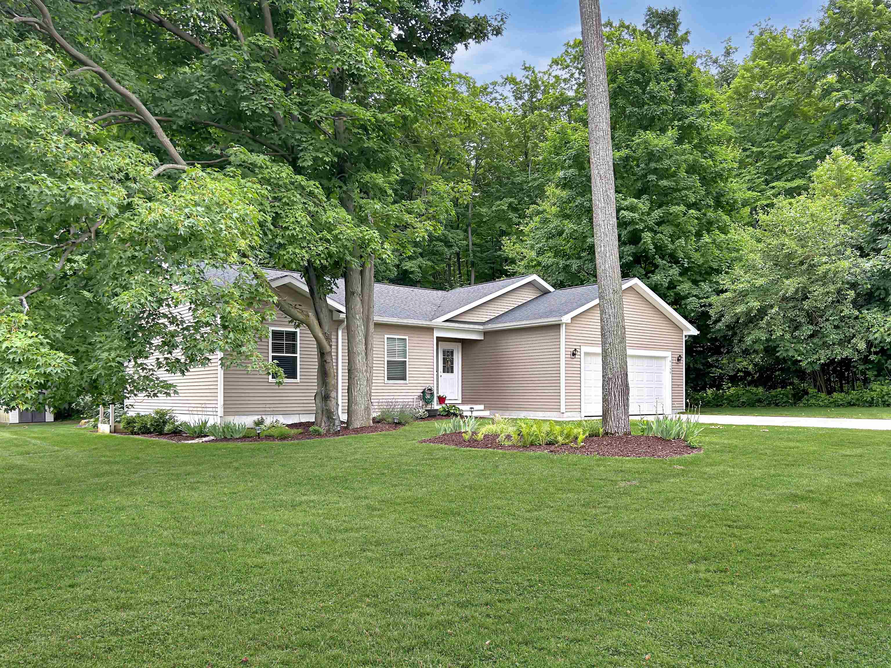 4159 Edwin Boulevard Grawn, MI 49637 - Photo 1 of 33