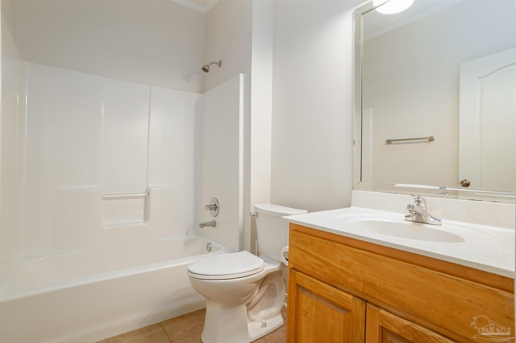 2351 Queens Ferry Lane Cantonment, FL 32533 - Photo 26 of 67 a bathroom with a sink a toilet and shower
