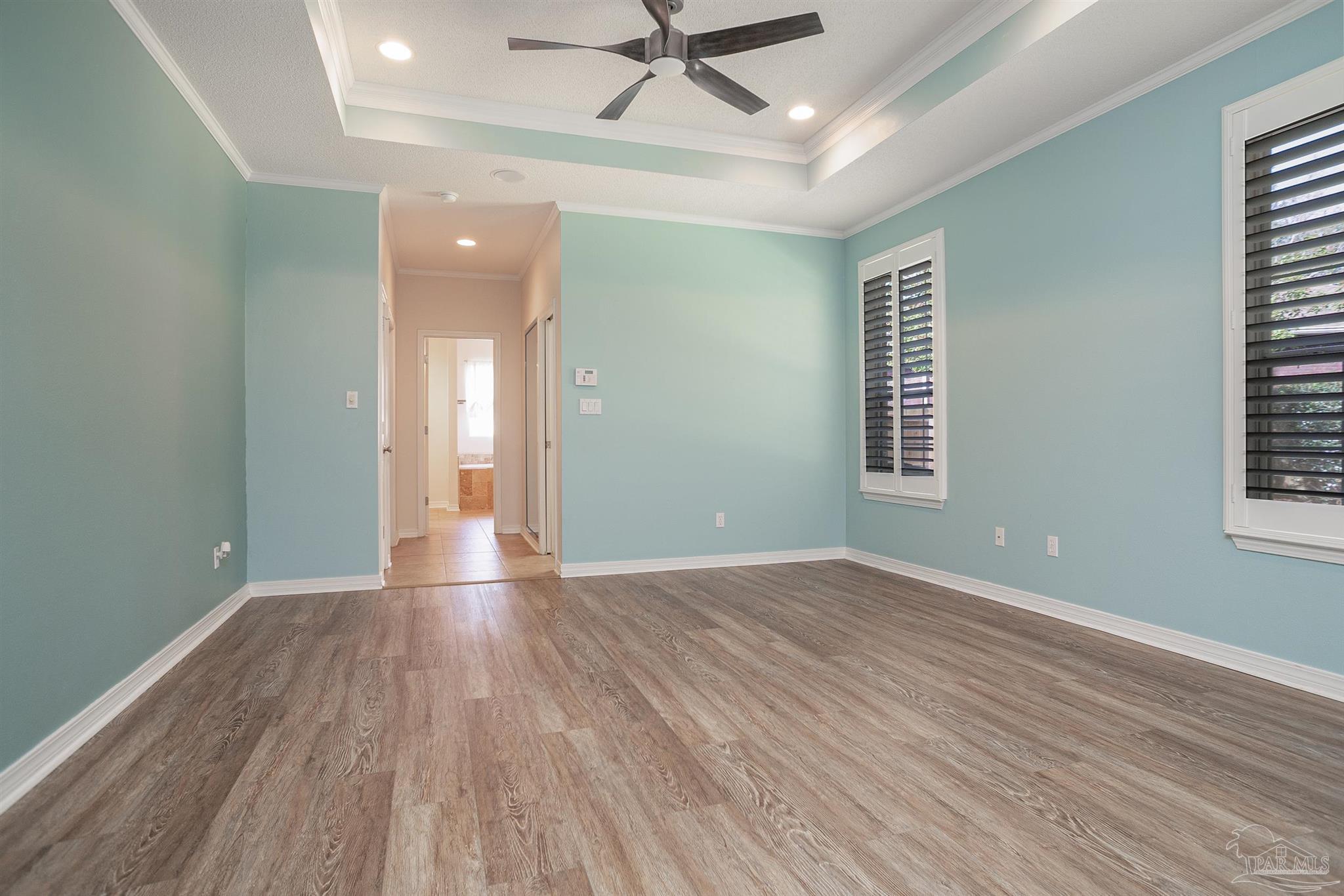 2351 Queens Ferry Lane Cantonment, FL 32533 - Photo 33 of 67 wooden floor in an empty room with a window