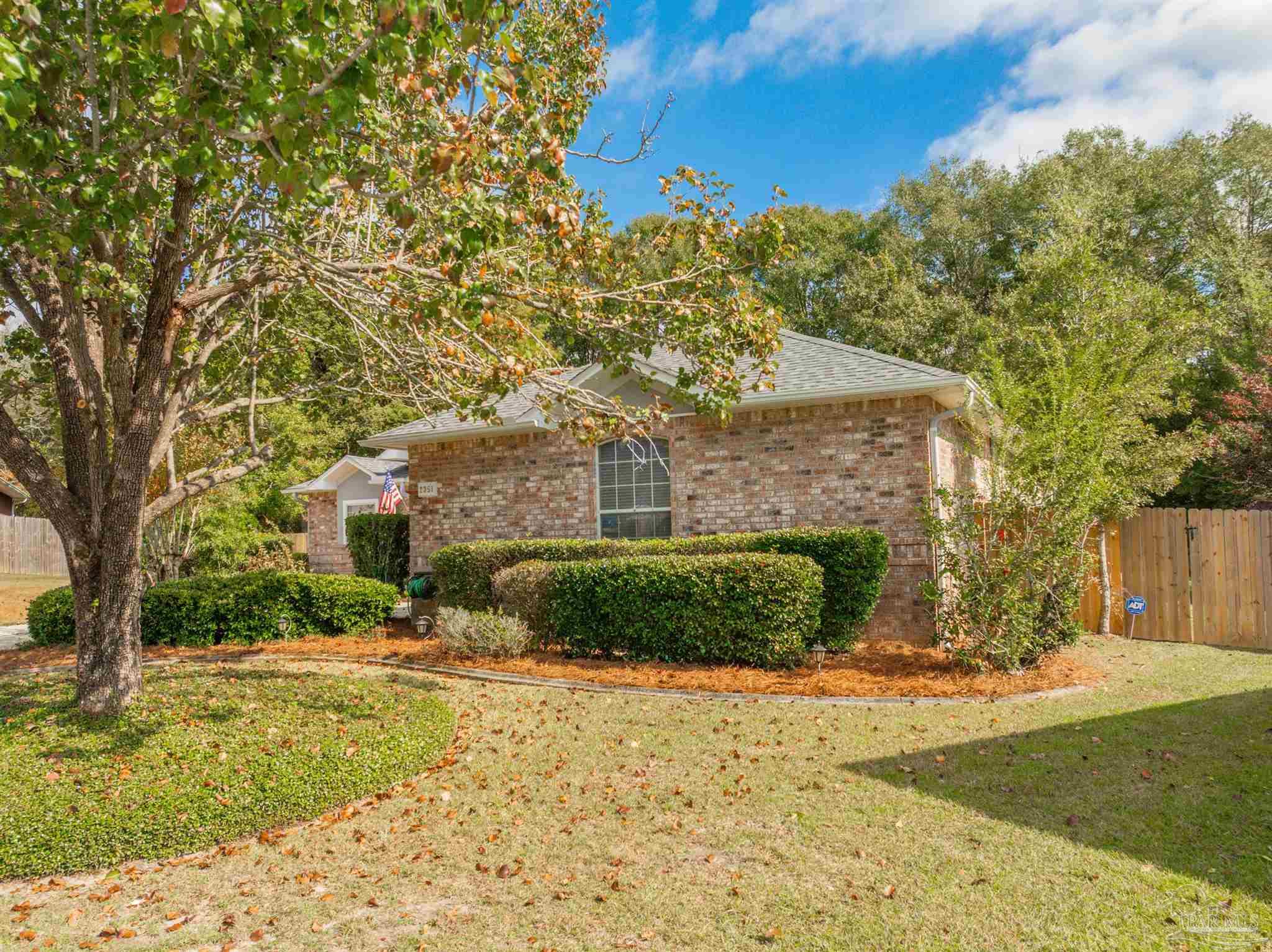 2351 Queens Ferry Lane Cantonment, FL 32533 - Photo 48 of 67 a front view of a house with a yard
