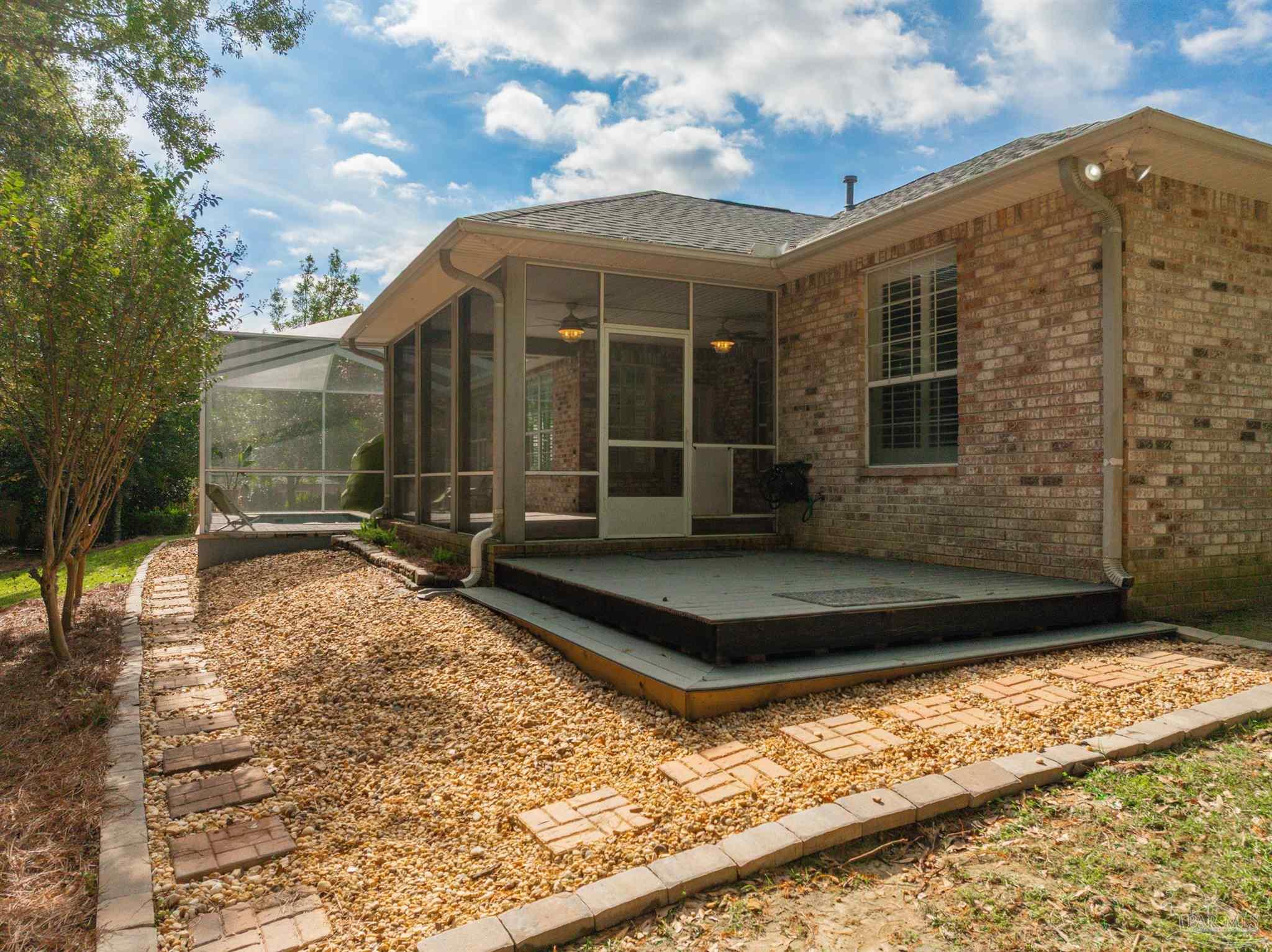 2351 Queens Ferry Lane Cantonment, FL 32533 - Photo 55 of 67 a front view of a house with a yard