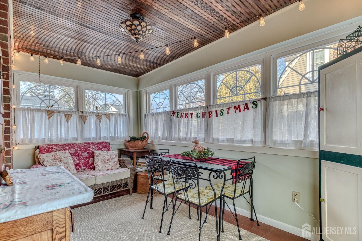 58 Harrison Avenue Milltown, NJ 08850 - Photo 15 of 30 a outdoor space with furniture and lots of potted plants