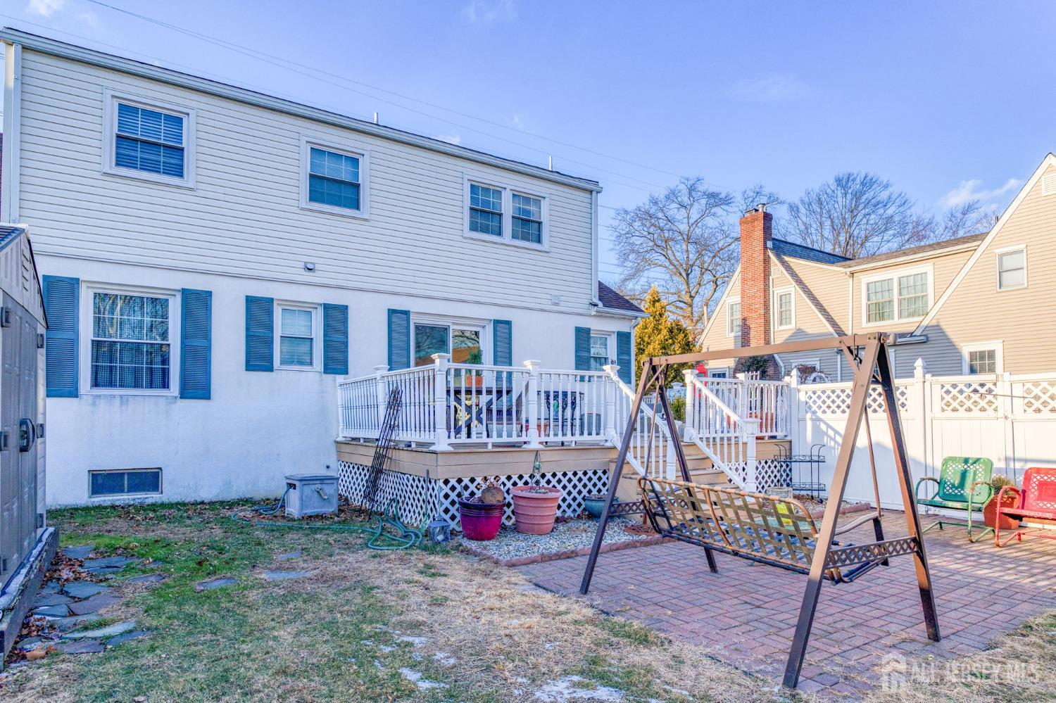 58 Harrison Avenue Milltown, NJ 08850 - Photo 22 of 30 a view of a house with backyard and sitting area