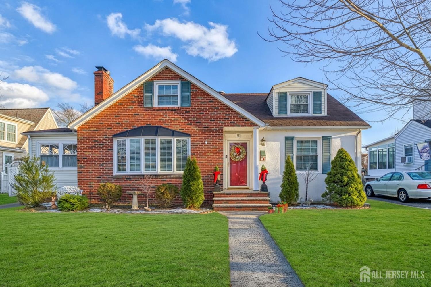58 Harrison Avenue Milltown, NJ 08850 - Photo 27 of 30 a front view of a house with a yard