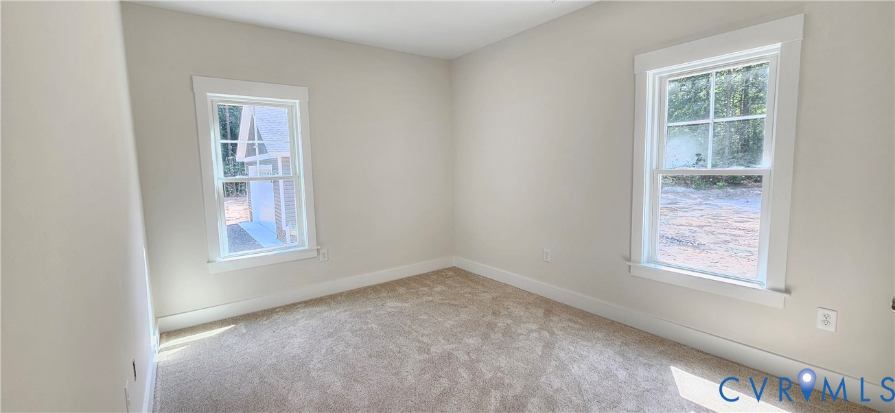 2982 Ashdale Road Center Cross, VA 22437 - Photo 14 of 17 Room featuring light-colored wall paint and neutra