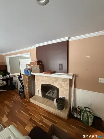 a room with furniture and a fireplace