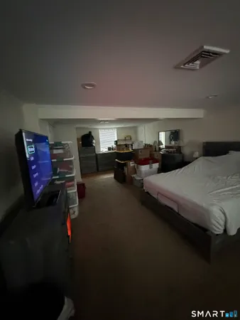 a bedroom with furniture