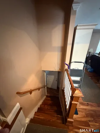 a view of entryway with wooden floor