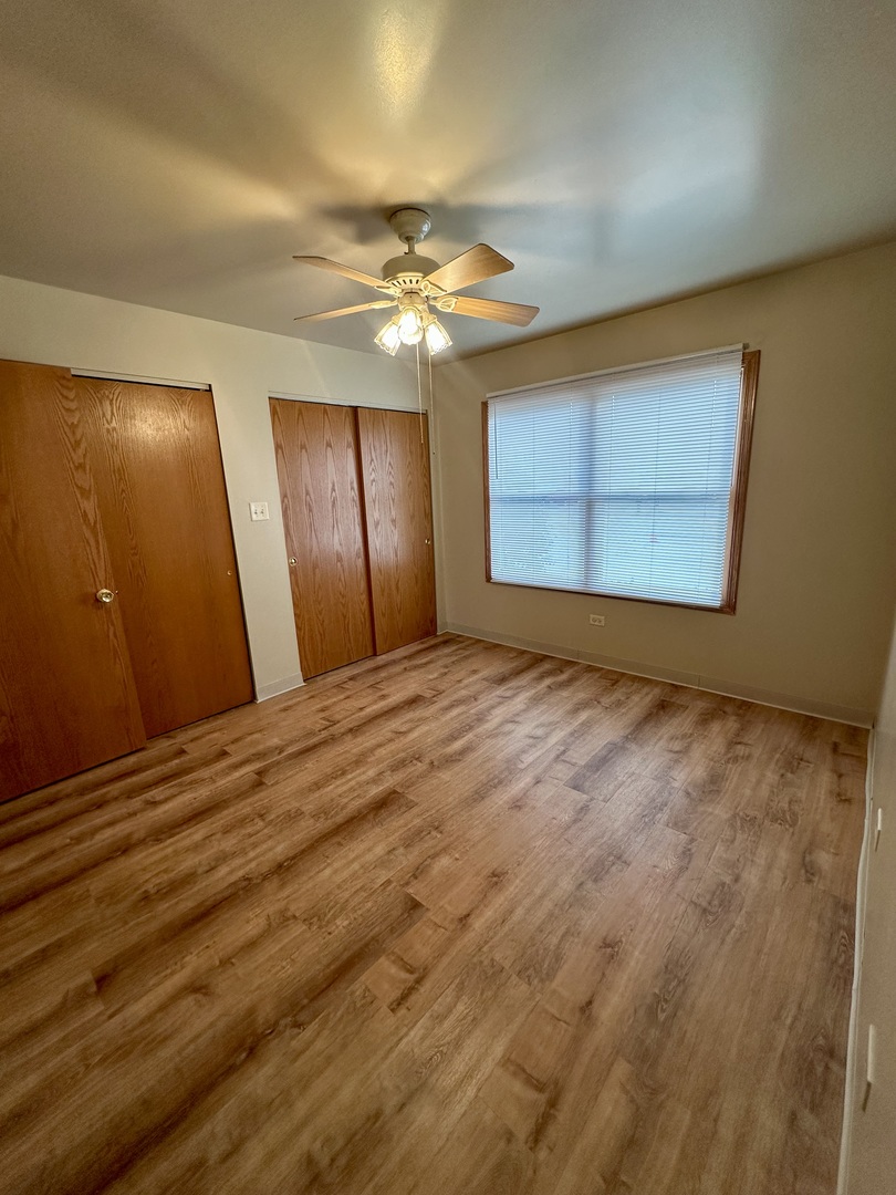465 North School Street, Unit 473 Diamond, IL 60416 - Photo 7 of 8 a view of empty room with window
