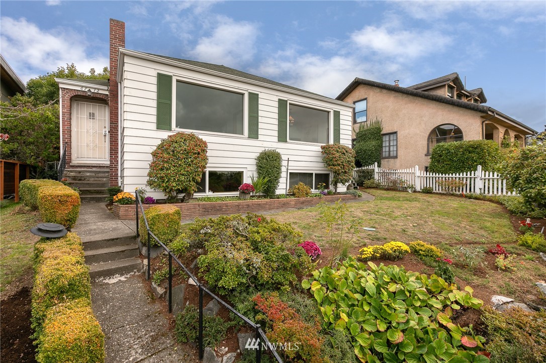 6712 42nd Avenue Southwest Seattle, WA 98136 - Photo 2 of 19 a view of a house with backyard