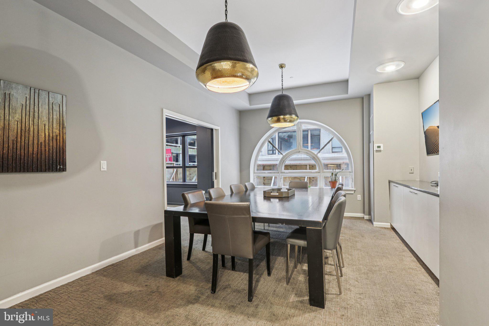 1425 Locust Street, Unit 7D Philadelphia, PA 19102 - Photo 28 of 39 a view of a dining room with furniture