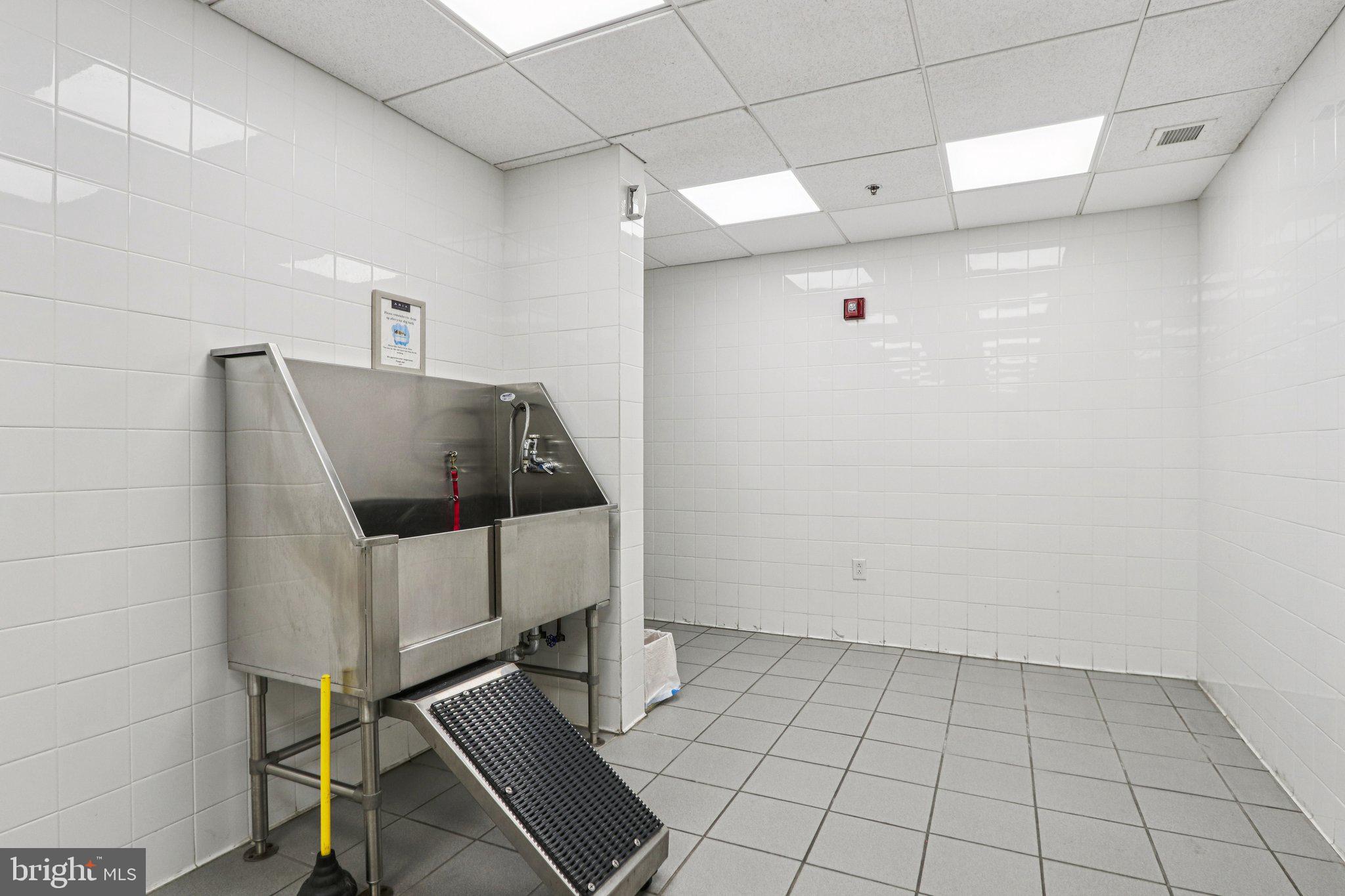 1425 Locust Street, Unit 7D Philadelphia, PA 19102 - Photo 34 of 39 a utility room with cabinets