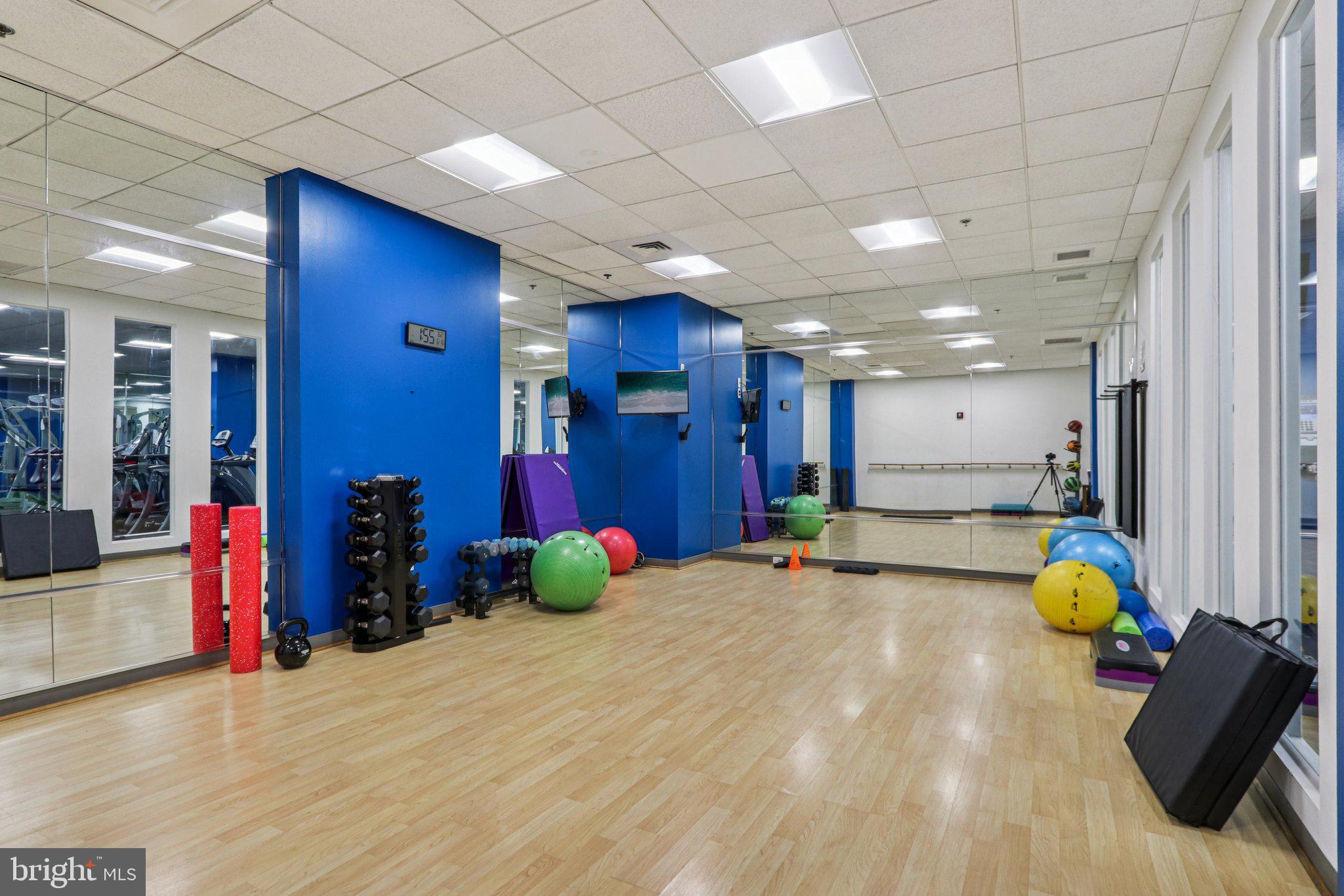 1425 Locust Street, Unit 7D Philadelphia, PA 19102 - Photo 38 of 39 a view of a room with gym equipment