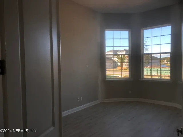 an empty room with windows